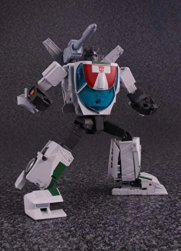 Transformers - Wheeljack - The Transformers: Masterpiece MP-20+ (Takara Tomy)ㅤ – Takara Tomy – ActionFigureBrasil — com base expositora